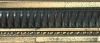 Empire � canaux dor� vieilli motif brun patin� 94X51 mm